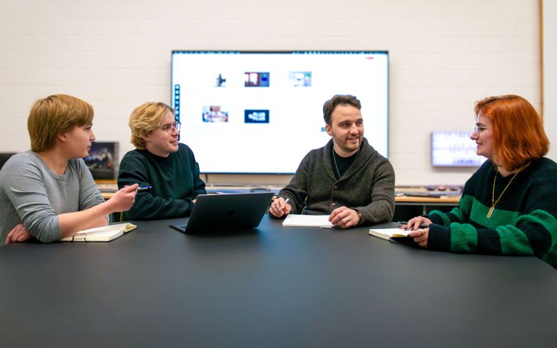 Gl&uuml;ckliche Teamsitzung